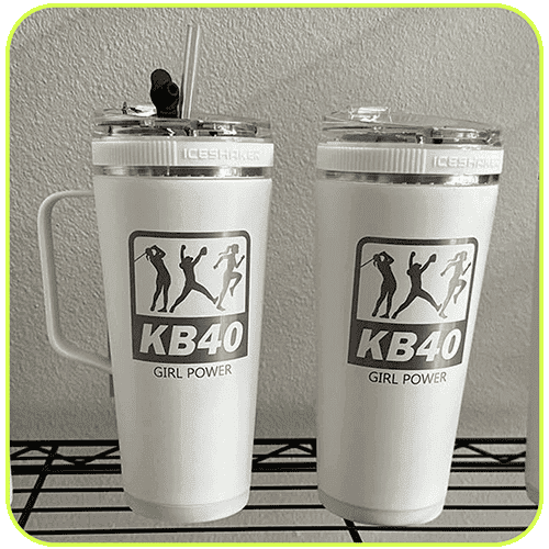 Two white tumblers with the KB40 Girl Power logo